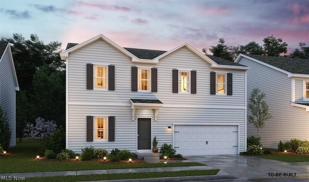 view of front facade with a garage