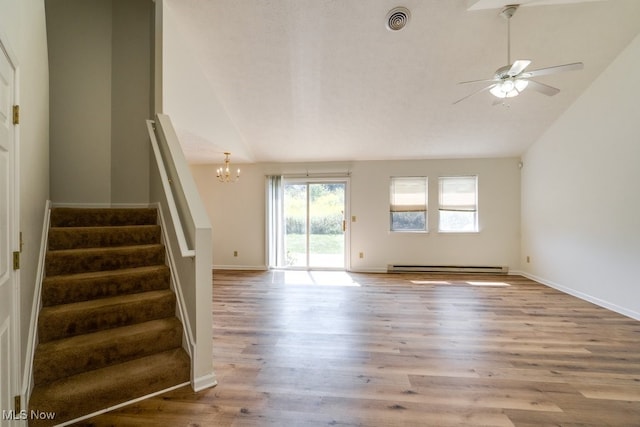 unfurnished living room featuring ceiling fan with notable chandelier, a baseboard radiator, high vaulted ceiling, and light hardwood / wood-style floors