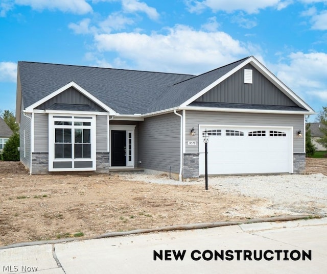 craftsman inspired home featuring a garage