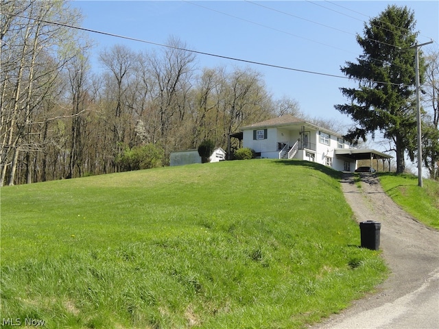 view of yard featuring a carport