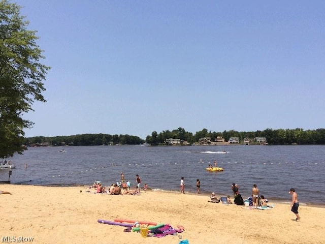 property view of water featuring a view of the beach