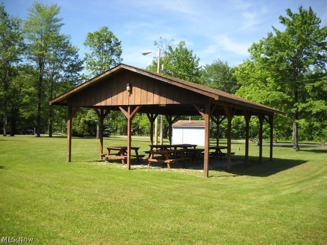 view of home's community with a lawn