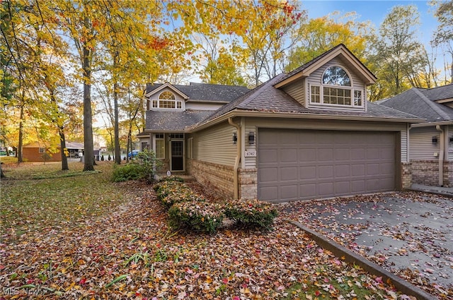 front of property with a garage