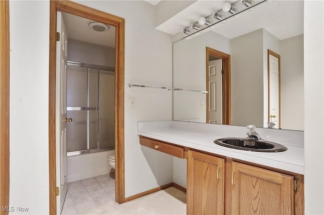6747 Lockwood Blvd, Youngstown, OH 44512 - bathroom featuring toilet, vanity, and bath / shower combo with glass door