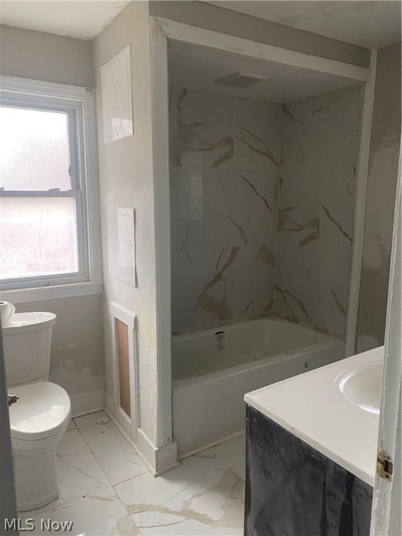 full bathroom featuring tile flooring, vanity, toilet, and a wealth of natural light