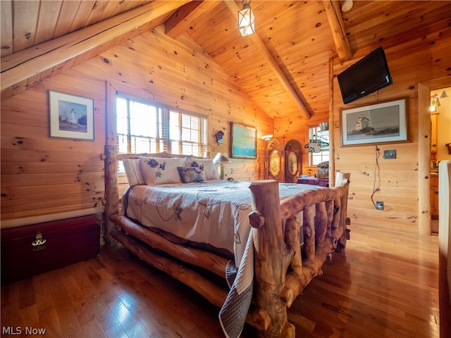 bedroom with beamed ceiling, wooden ceiling, and wood-type flooring