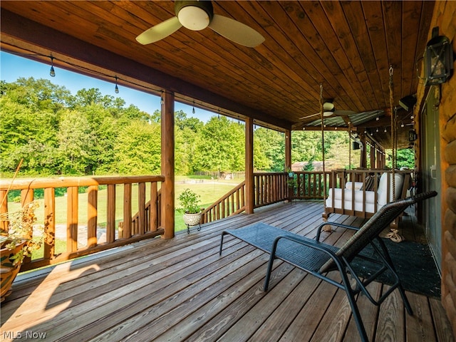 wooden deck with ceiling fan