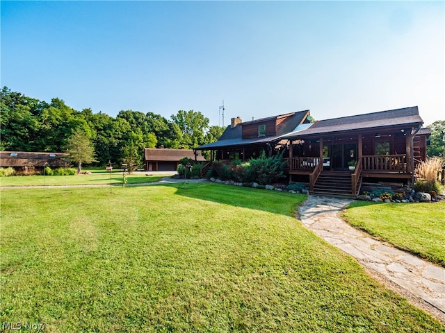 view of yard featuring a wooden deck