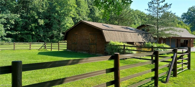 exterior space featuring a rural view and a lawn