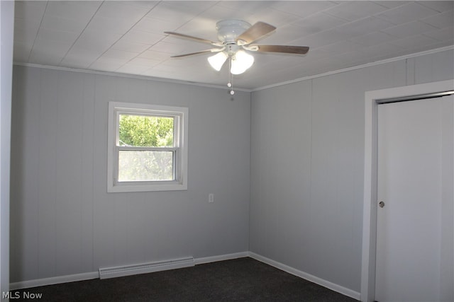 empty room featuring carpet, a baseboard heating unit, and ceiling fan