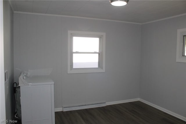 laundry room featuring ornamental molding, a baseboard radiator, washer / dryer, and dark wood-type flooring