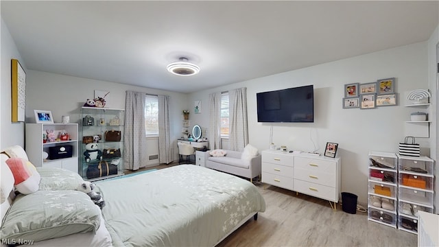 bedroom featuring light wood-type flooring