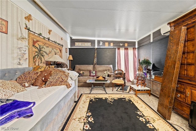 bedroom featuring a wall mounted AC