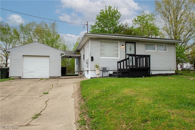 view of front of home featuring a garage and a front lawn