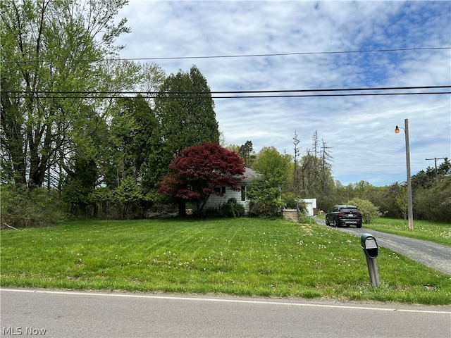 view of front of property with a front lawn