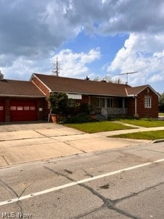 single story home with a garage