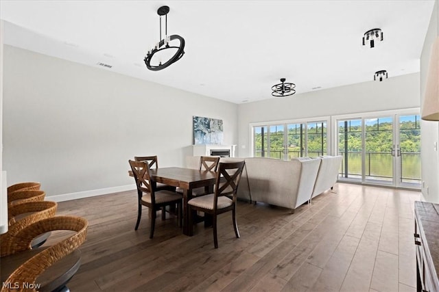 dining room with hardwood / wood-style floors