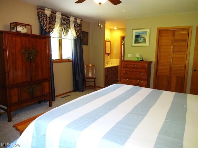 11421 Clay Rd, Newton, WV 25266 - bedroom with connected bathroom, ceiling fan, carpet, visible vents, and a closet