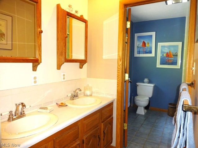 11421 Clay Rd, Newton, WV 25266 - bathroom featuring double vanity, toilet, tile patterned floors, and a sink