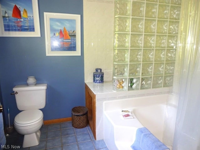 11421 Clay Rd, Newton, WV 25266 - bathroom with baseboards, tile patterned flooring, toilet, and a bathtub