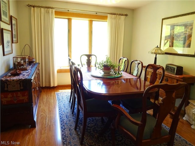 11421 Clay Rd, Newton, WV 25266 - dining area with wood finished floors