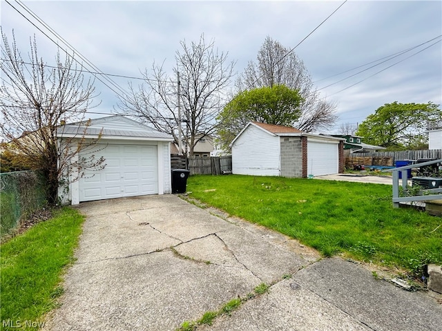 garage with a lawn