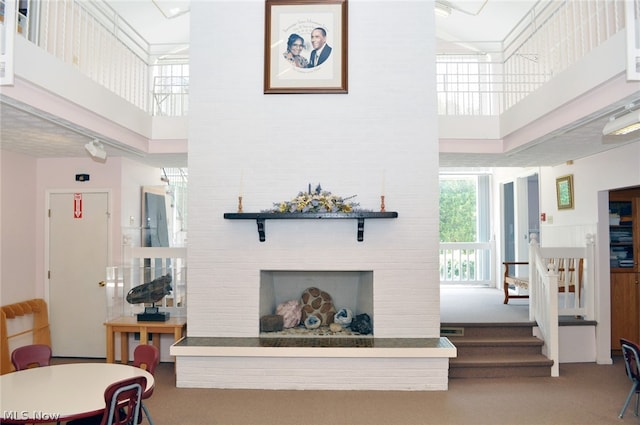 living room with a high ceiling