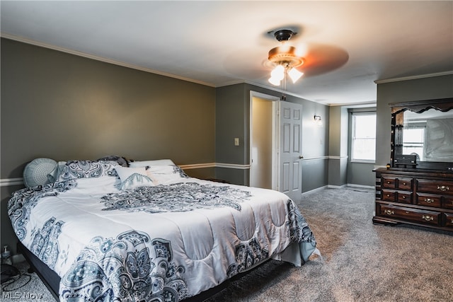 bedroom featuring carpet floors, ceiling fan, and ornamental molding