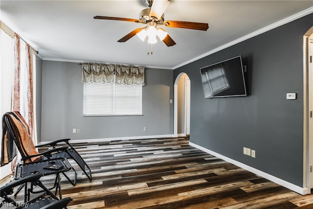 spare room featuring dark hardwood / wood-style floors, a wealth of natural light, and ceiling fan