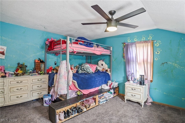 carpeted bedroom featuring vaulted ceiling, ceiling fan, and a textured ceiling