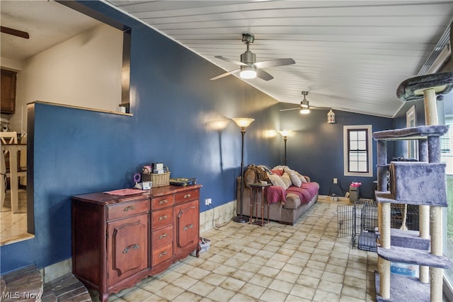 interior space with lofted ceiling and ceiling fan