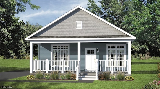 view of front of home featuring a front lawn and a porch