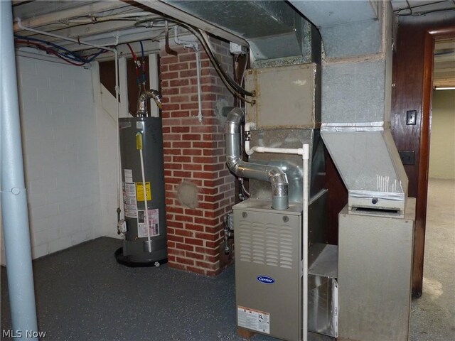 utility room featuring water heater