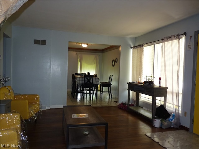 living room featuring dark hardwood / wood-style floors