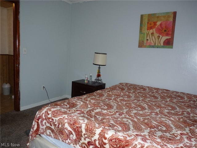 bedroom featuring carpet floors and ensuite bath