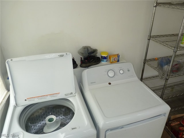 laundry room with washer and dryer