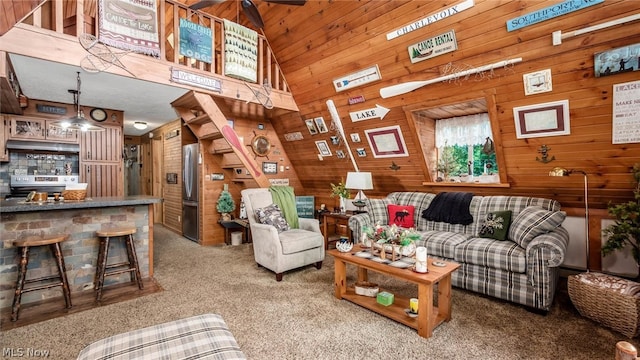 living room featuring wooden walls, wooden ceiling, high vaulted ceiling, and carpet floors