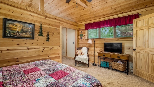 bedroom featuring wood ceiling, wooden walls, light carpet, and ceiling fan