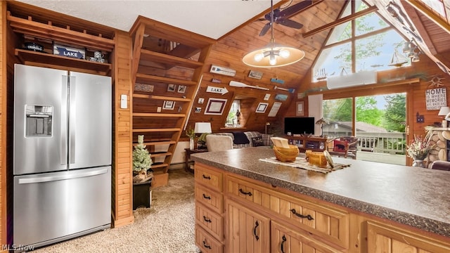 kitchen with ceiling fan, light carpet, wood ceiling, hanging light fixtures, and stainless steel fridge with ice dispenser