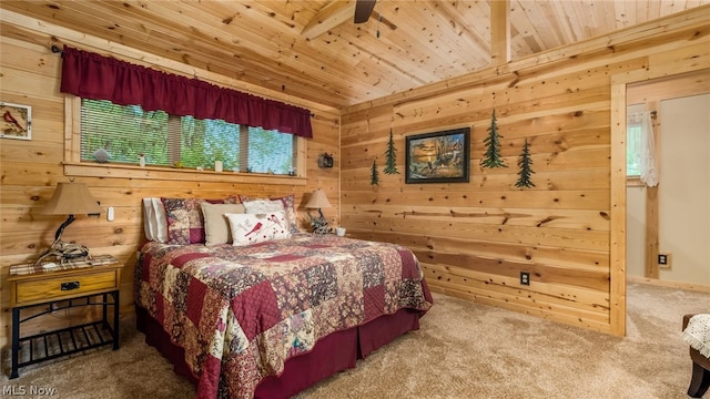 bedroom with wooden ceiling, ceiling fan, carpet flooring, and wooden walls