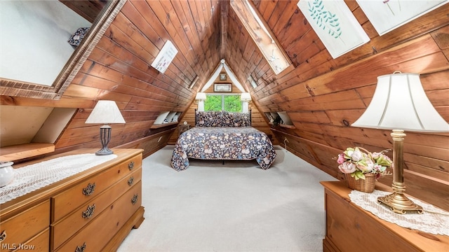 bedroom featuring wood ceiling, light carpet, vaulted ceiling with skylight, and wooden walls