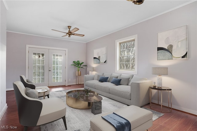 living room featuring ceiling fan, dark hardwood / wood-style floors, french doors, and ornamental molding