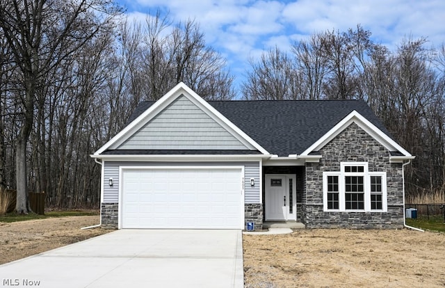 craftsman inspired home with a garage