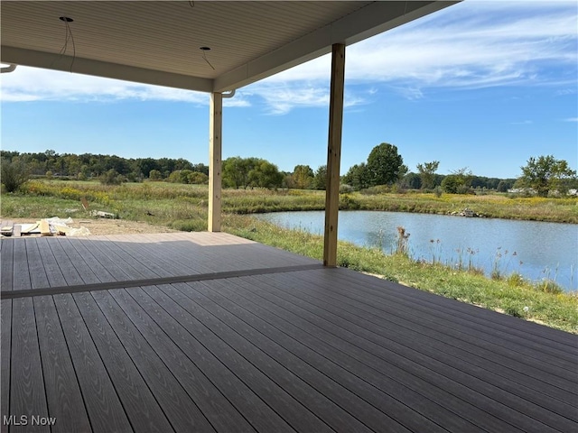 wooden deck with a water view