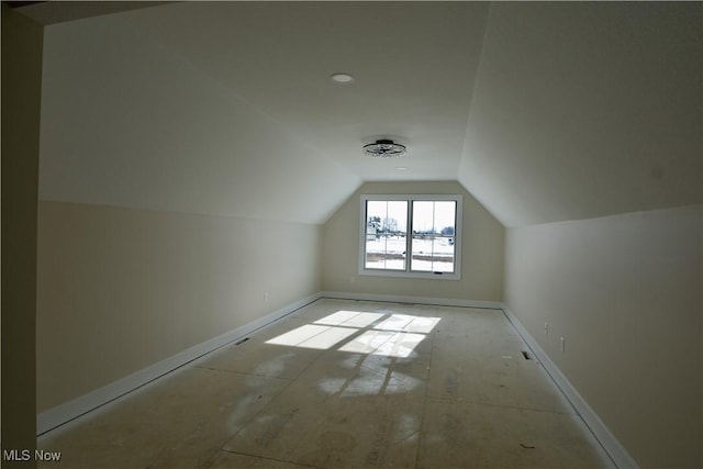 bonus room featuring lofted ceiling