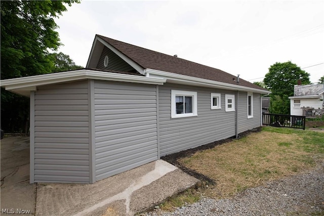 view of home's exterior featuring a yard