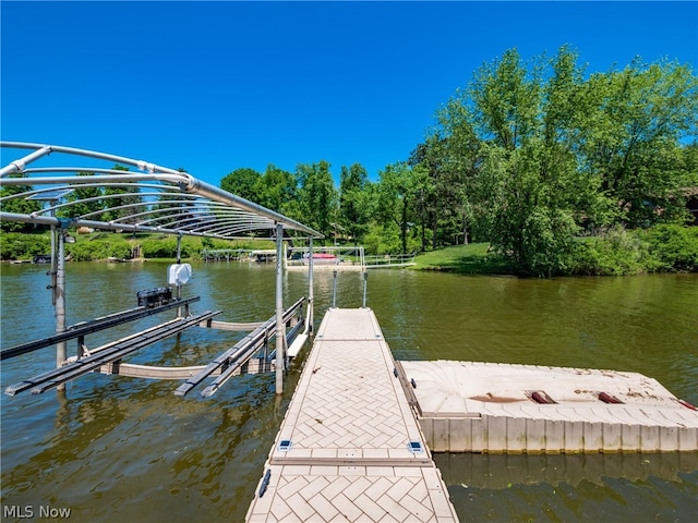 view of dock with a water view