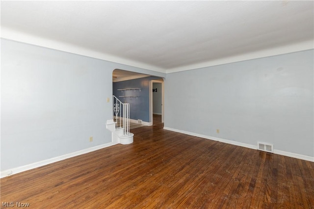 unfurnished living room with hardwood / wood-style flooring