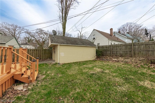 view of yard featuring a wooden deck