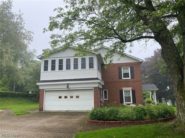 front of property with a garage